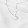 Heart Pearl & Silver Locket Necklace sold by Wanderlust and Co