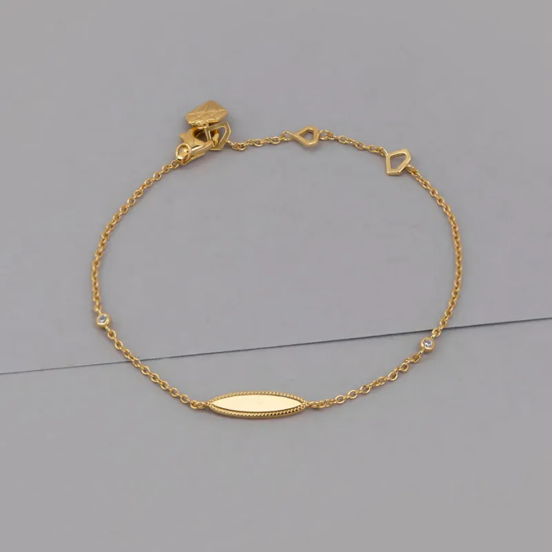 Oval ID 14K Gold Vermeil Bracelet sold by Wanderlust and Co