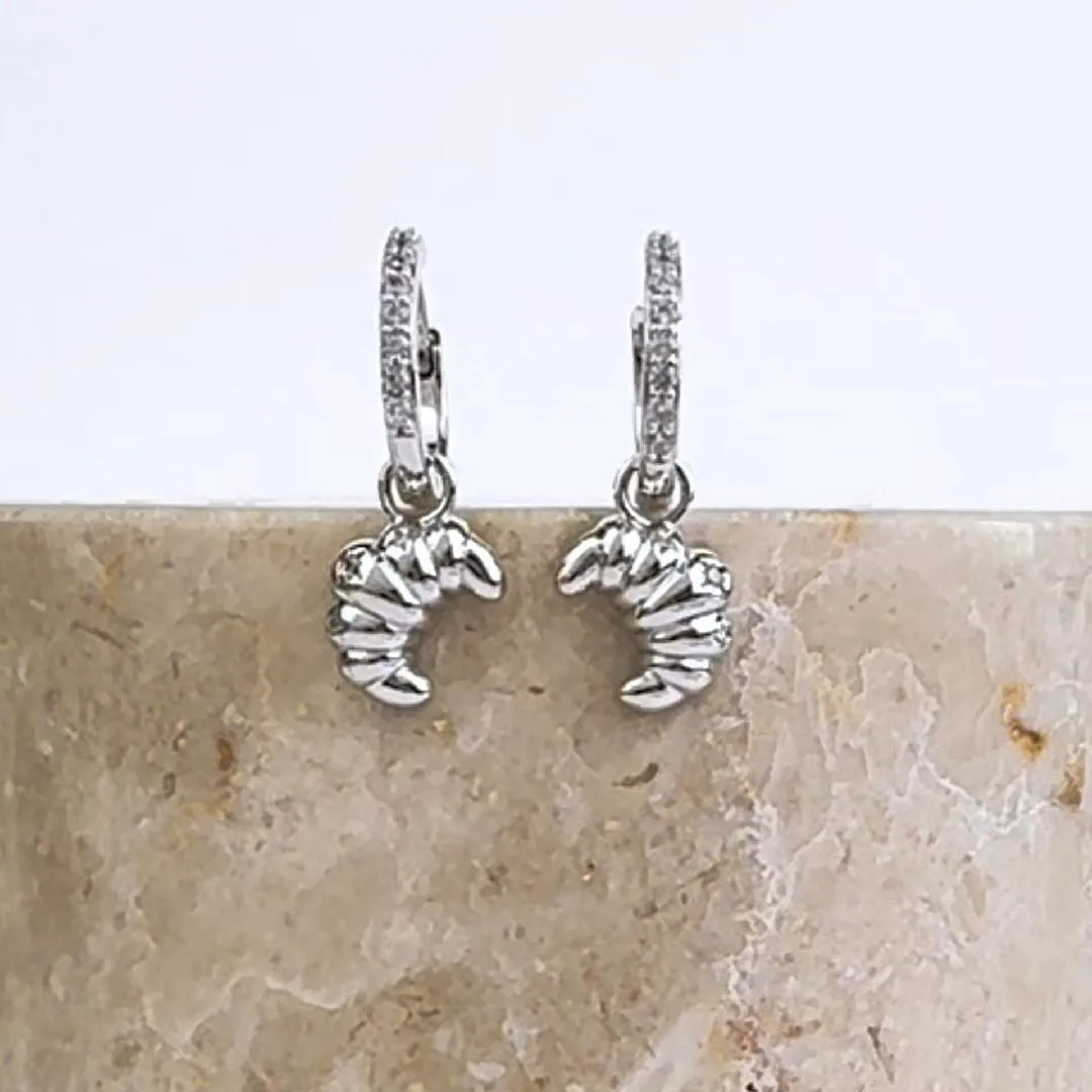 Croissant Charm Silver Huggie Earrings sold by Wanderlust and Co product image thumbnail 3