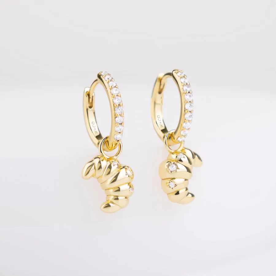 Croissant Charm Gold Huggie Earrings sold by Wanderlust and Co