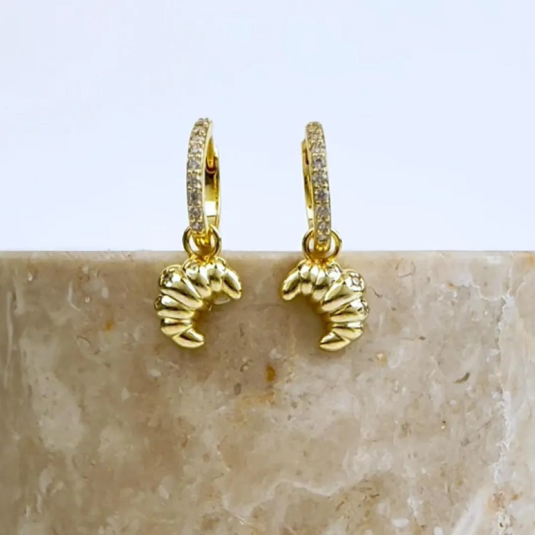 Croissant Charm Gold Huggie Earrings sold by Wanderlust and Co product image thumbnail 3