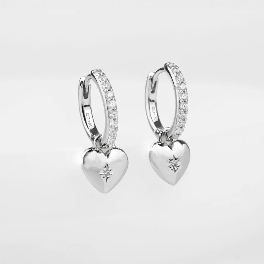 Heart Charm Silver Huggie Earrings sold by Wanderlust and Co