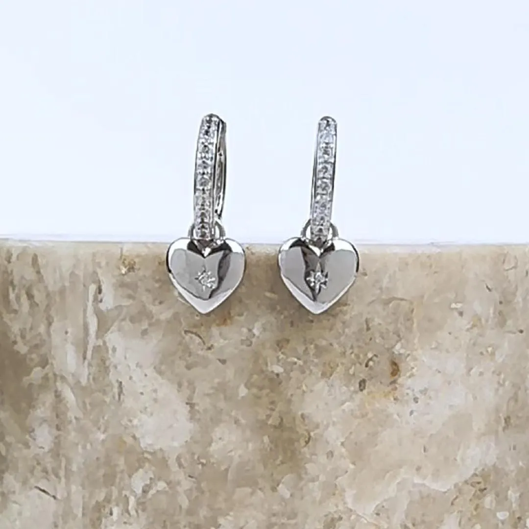 Heart Charm Silver Huggie Earrings sold by Wanderlust and Co product image thumbnail 5