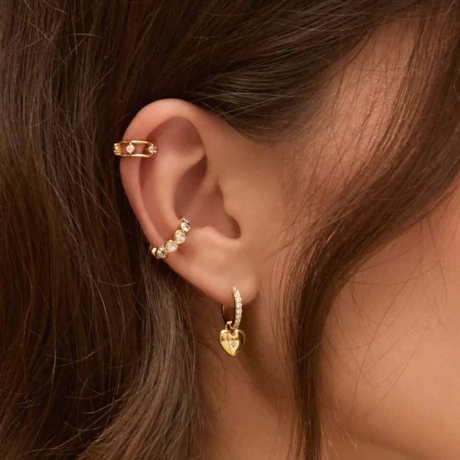 Heart Charm Gold Huggie Earrings sold by Wanderlust and Co product image thumbnail 2