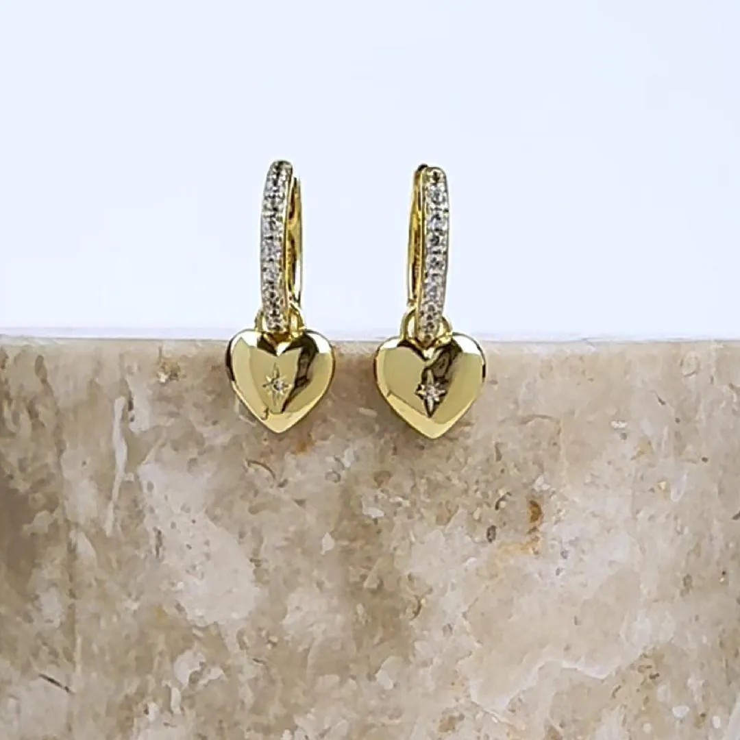 Heart Charm Gold Huggie Earrings sold by Wanderlust and Co product image thumbnail 3