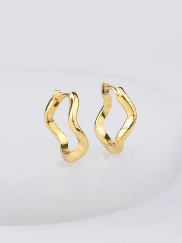 Scallop Gold 10mm Huggie Earrings sold by Wanderlust and Co