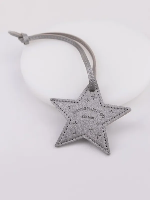 Glimmer Star Silver Bag Tag sold by Wanderlust and Co