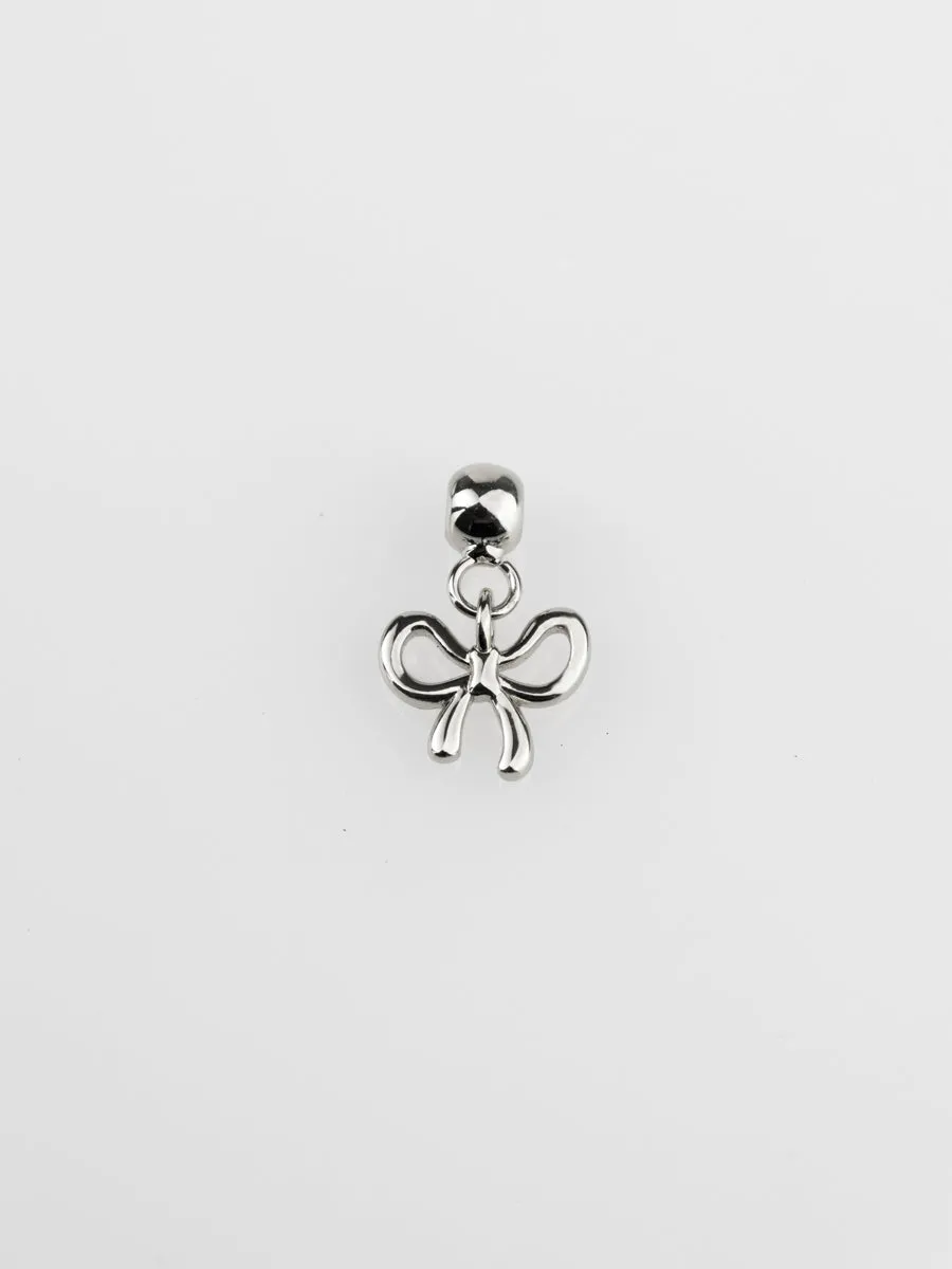 Bow Silver Drop Charm sold by Wanderlust and Co product image thumbnail 4