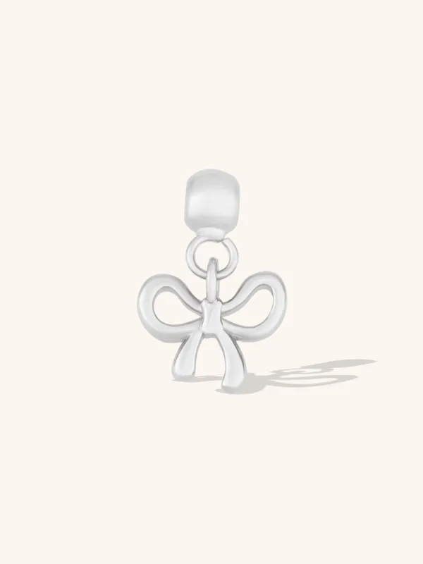 Bow Silver Drop Charm sold by Wanderlust and Co