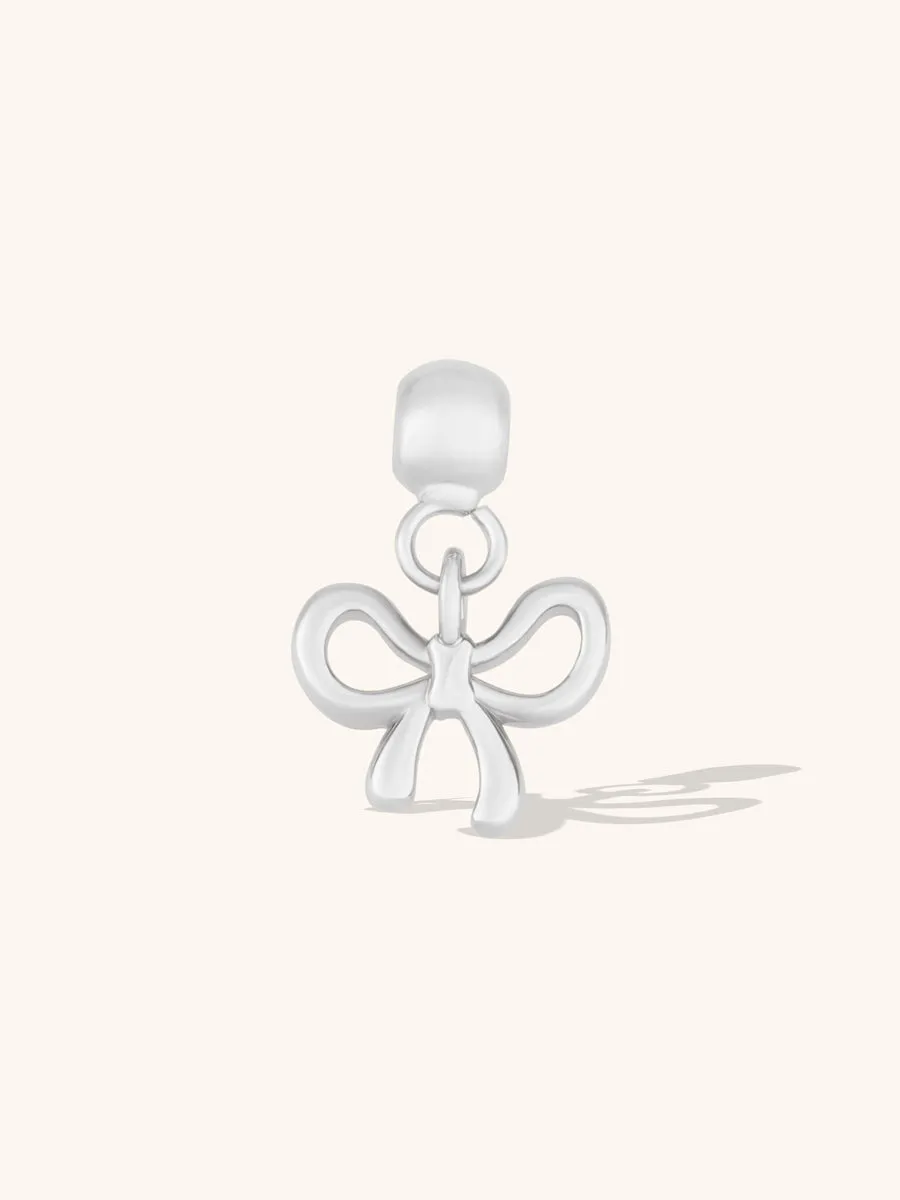 Bow Silver Drop Charm sold by Wanderlust and Co