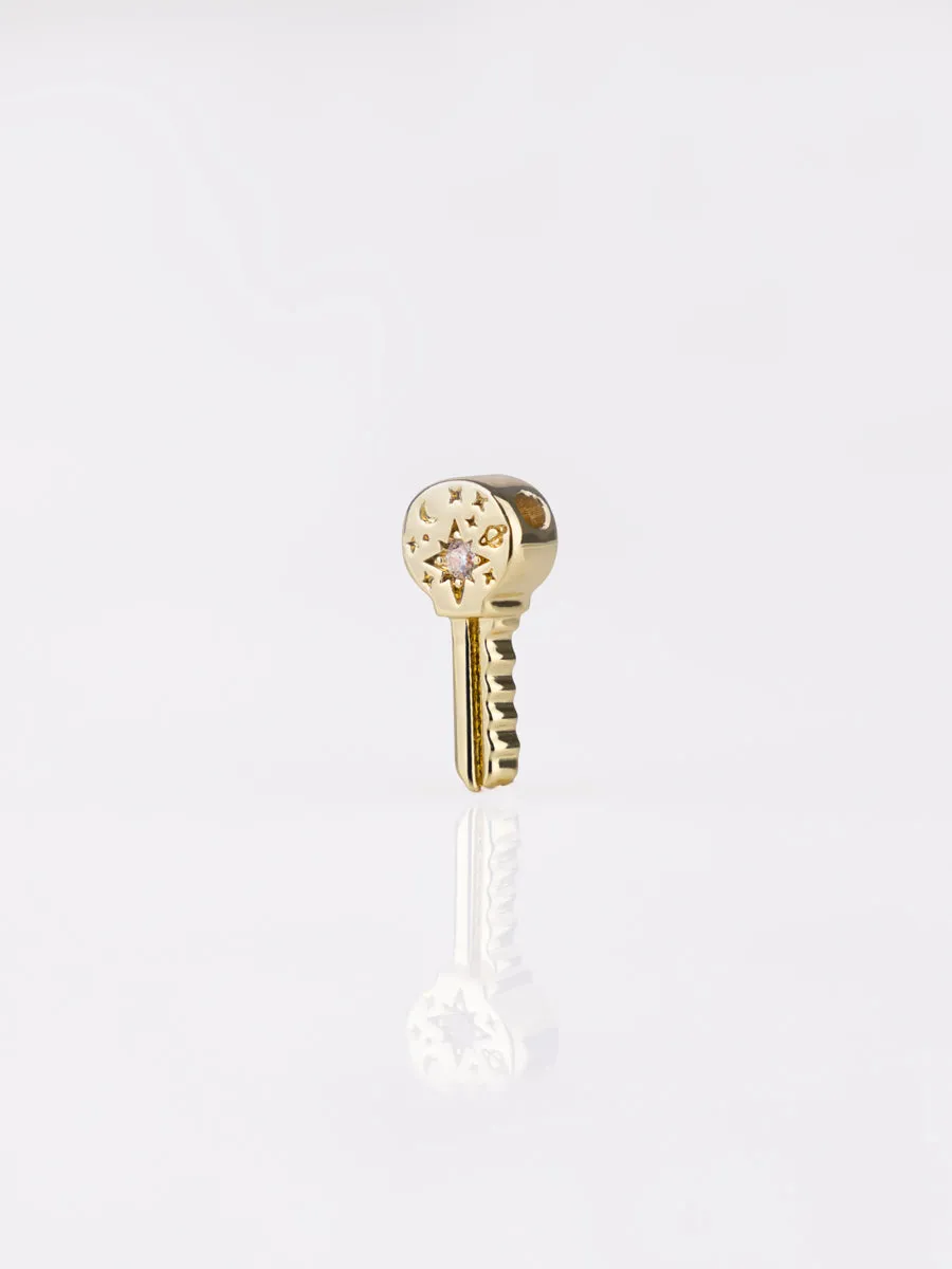 Universe Key Gold Charm sold by Wanderlust and Co product image thumbnail 4