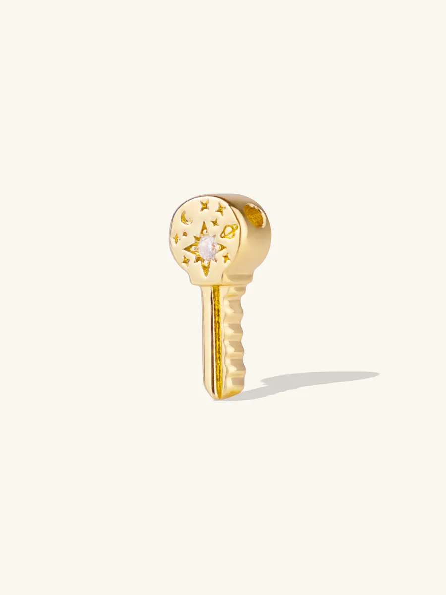 Universe Key Gold Charm sold by Wanderlust and Co product image thumbnail 5