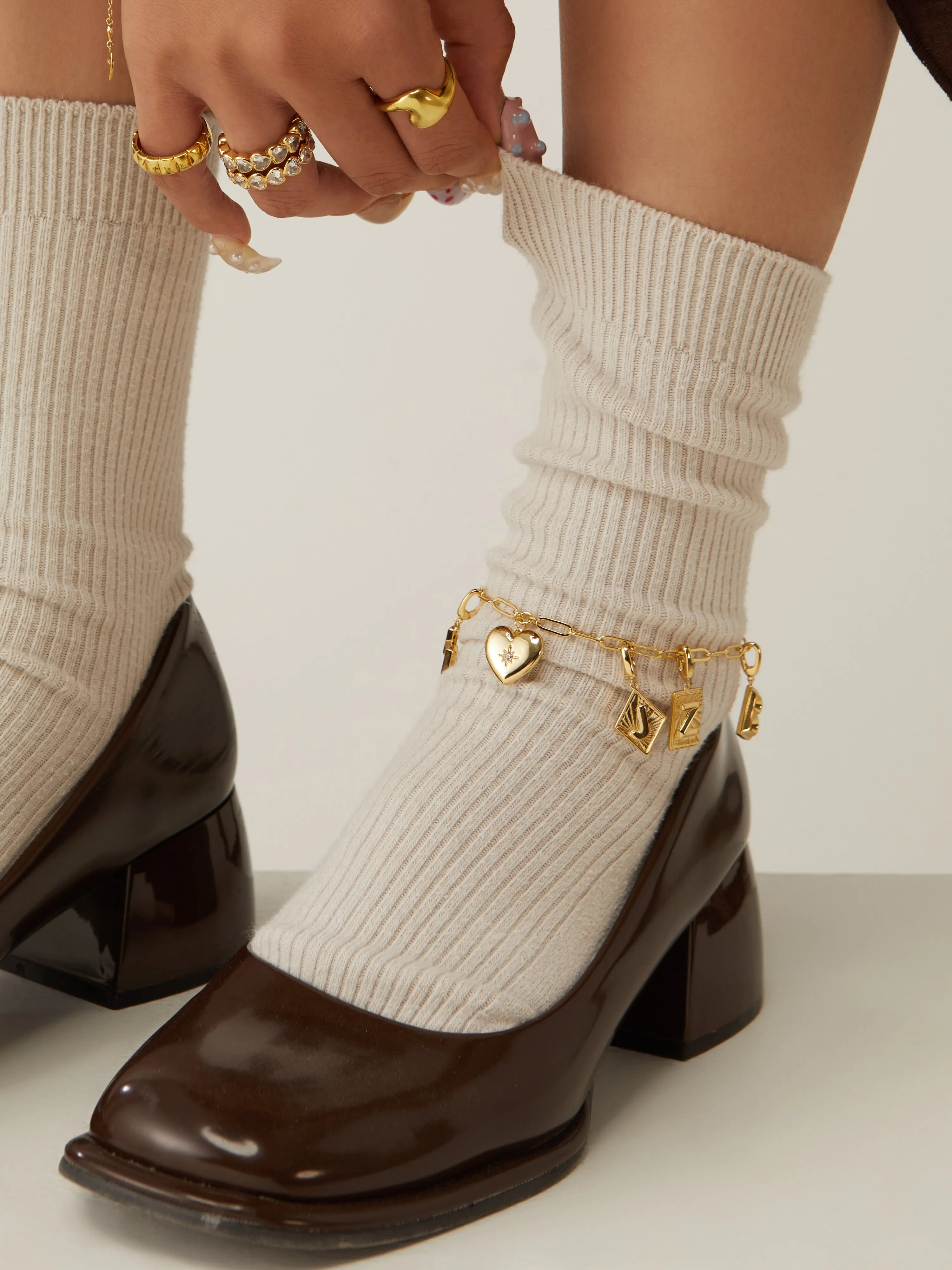 Alphabet Gold Charm sold by Wanderlust and Co product image thumbnail 4