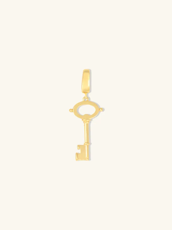 Key Gold Charm sold by Wanderlust and Co