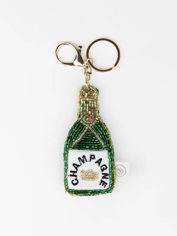 Beaded Champagne Bag Charm sold by Wanderlust and Co