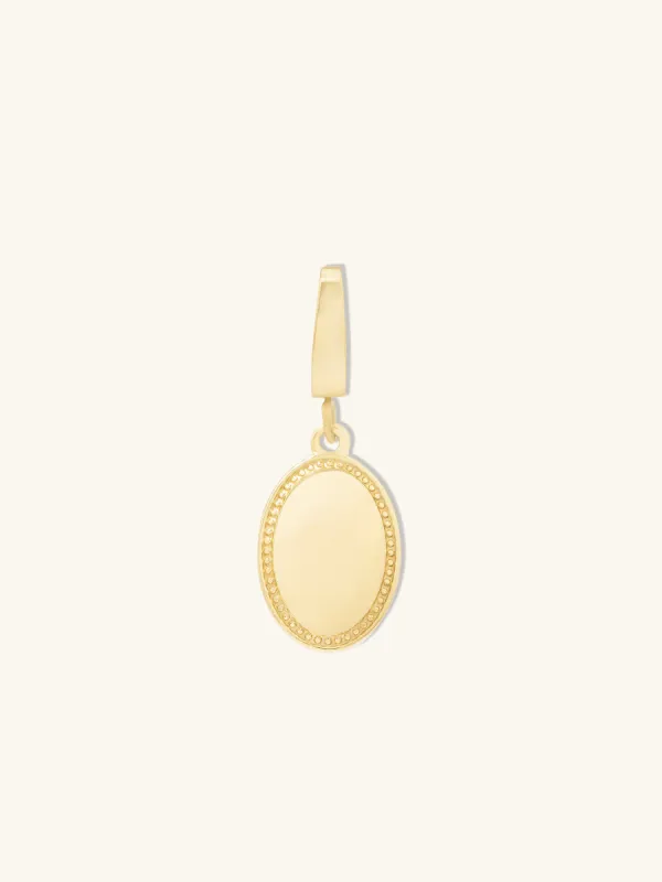 Vintage Oval Gold Charm made by Wanderlust and Co