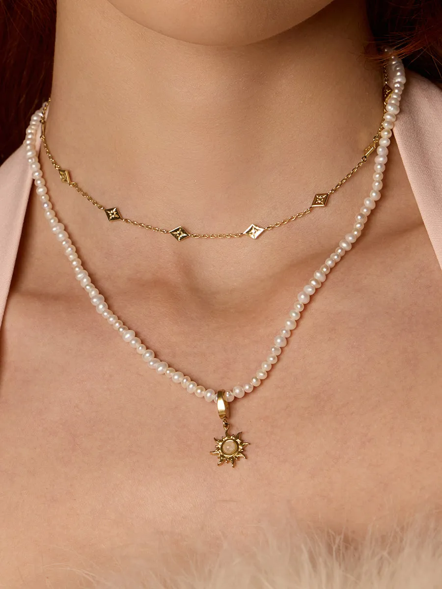 Sunray Ivory & Gold Charm sold by Wanderlust and Co product image thumbnail 2