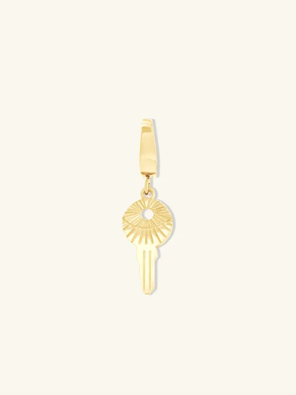 Petite Key Gold Charm sold by Wanderlust and Co