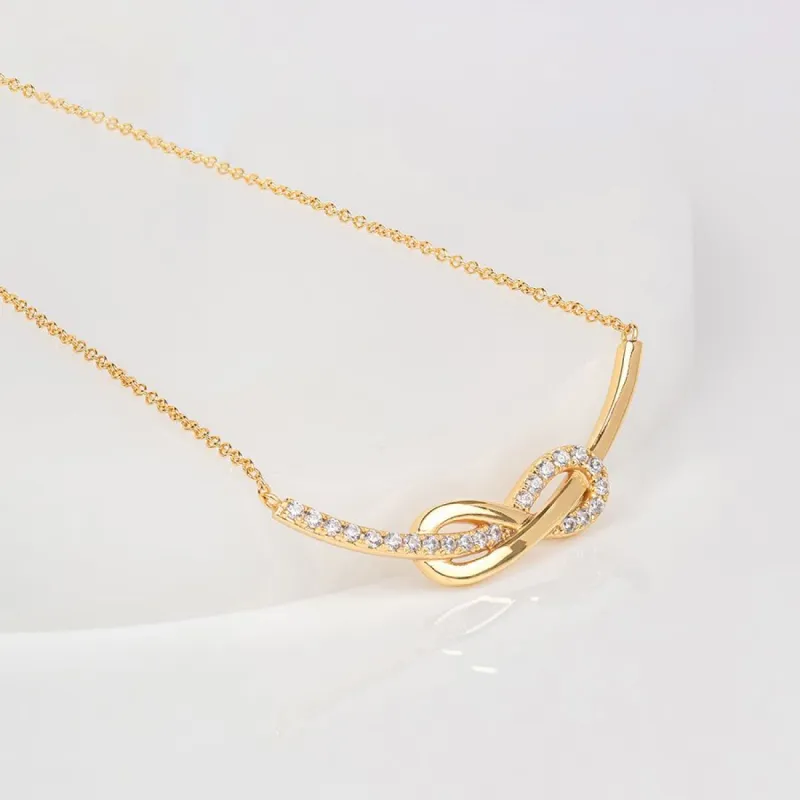 Knot Pave Gold Necklace sold by Wanderlust and Co