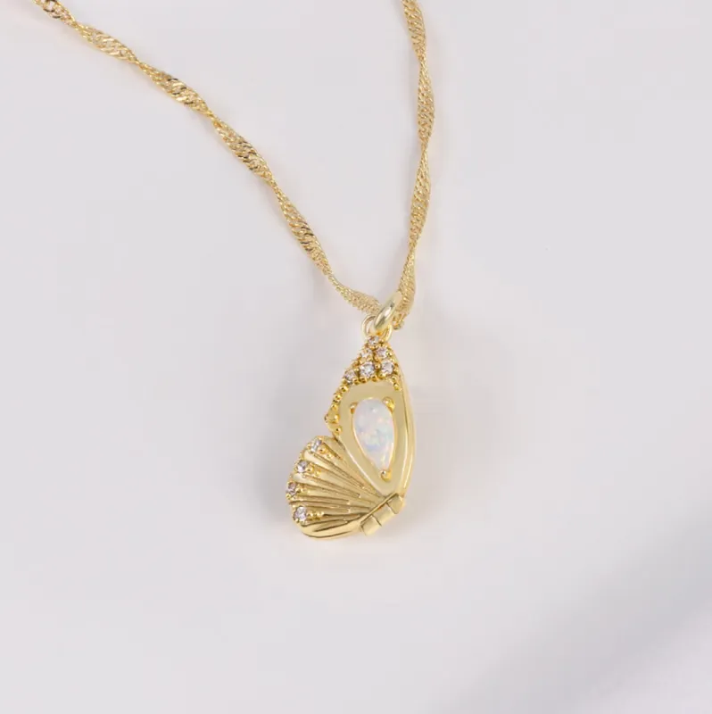 Butterfly Opal Gold Locket Necklace sold by Wanderlust and Co