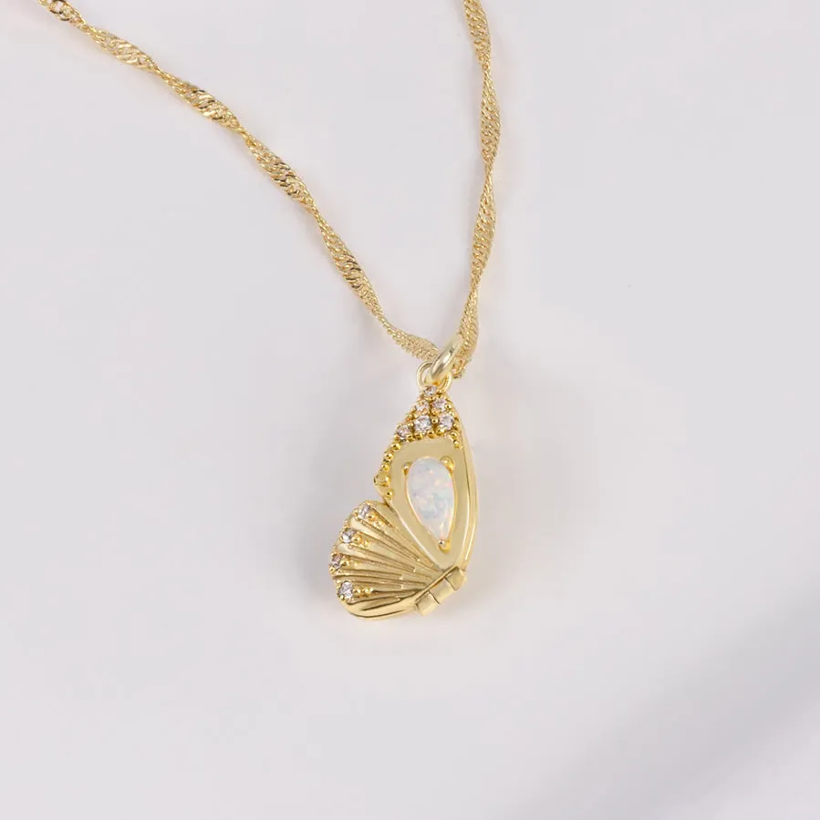 Butterfly Opal Gold Locket Necklace sold by Wanderlust and Co