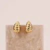 Teardrop Seashell Gold 20mm Stud Earrings sold by Wanderlust and Co