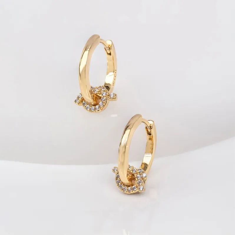Knot Pave Gold Huggie Earrings sold by Wanderlust and Co