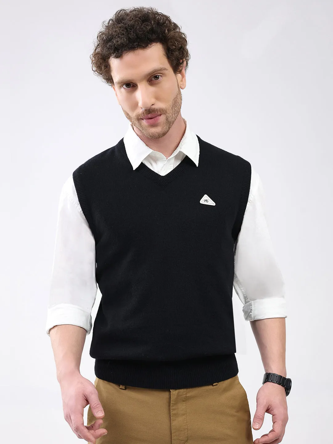Men Black Solid V Neck Sleeveless Sweater sold by Monte Carlo