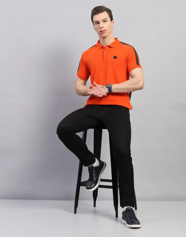 Rock.it Men Orange Solid Polo Collar Half Sleeve T-Shirt made by Monte Carlo