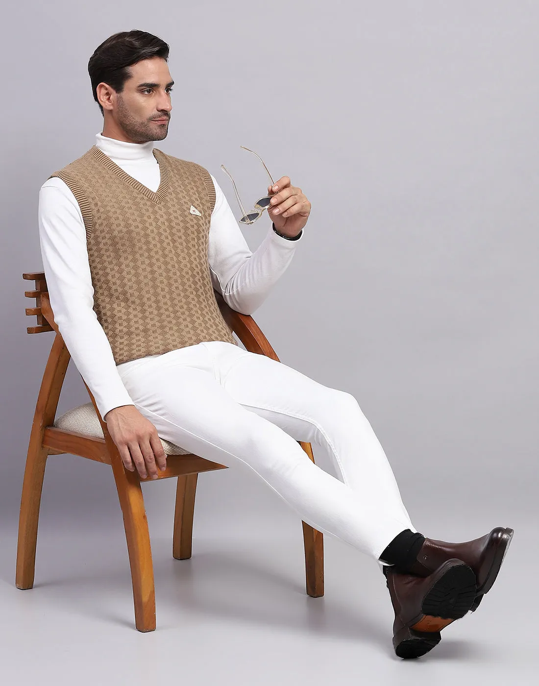 Men Khaki Self Design V Neck Sleeveless Sweater sold by Monte Carlo