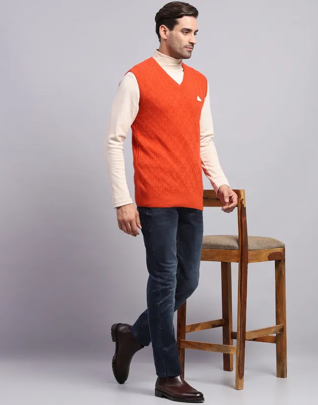 Men Orange Self Design V Neck Sleeveless Sweater made by Monte Carlo
