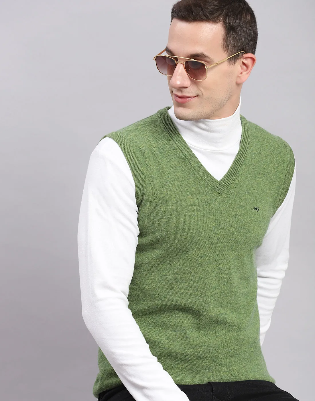 Men Green Solid V Neck Sleeveless Sweater sold by Monte Carlo