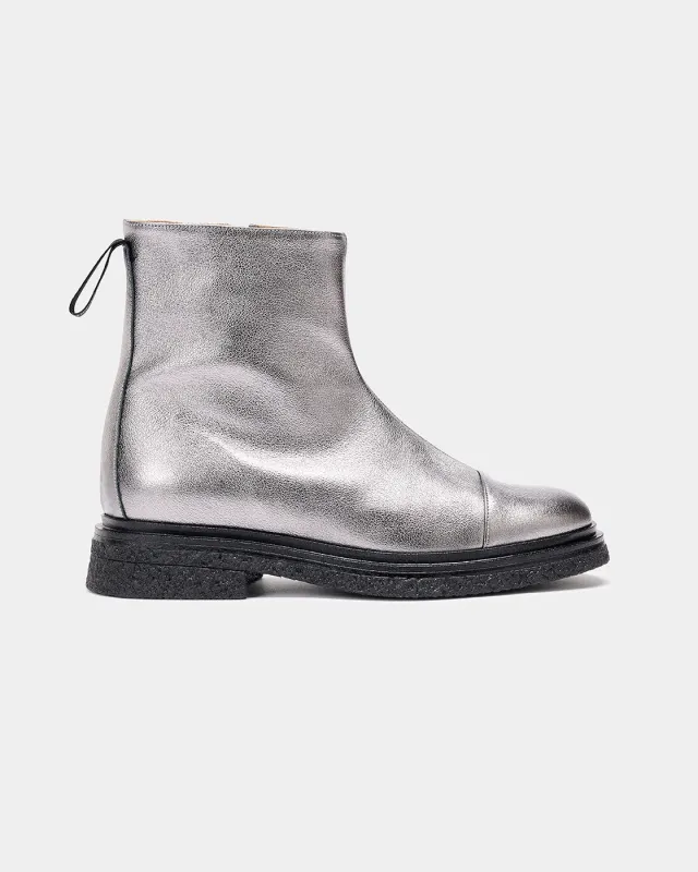 MUESTRA PUNO PLATA METAL sold by NAGUISA