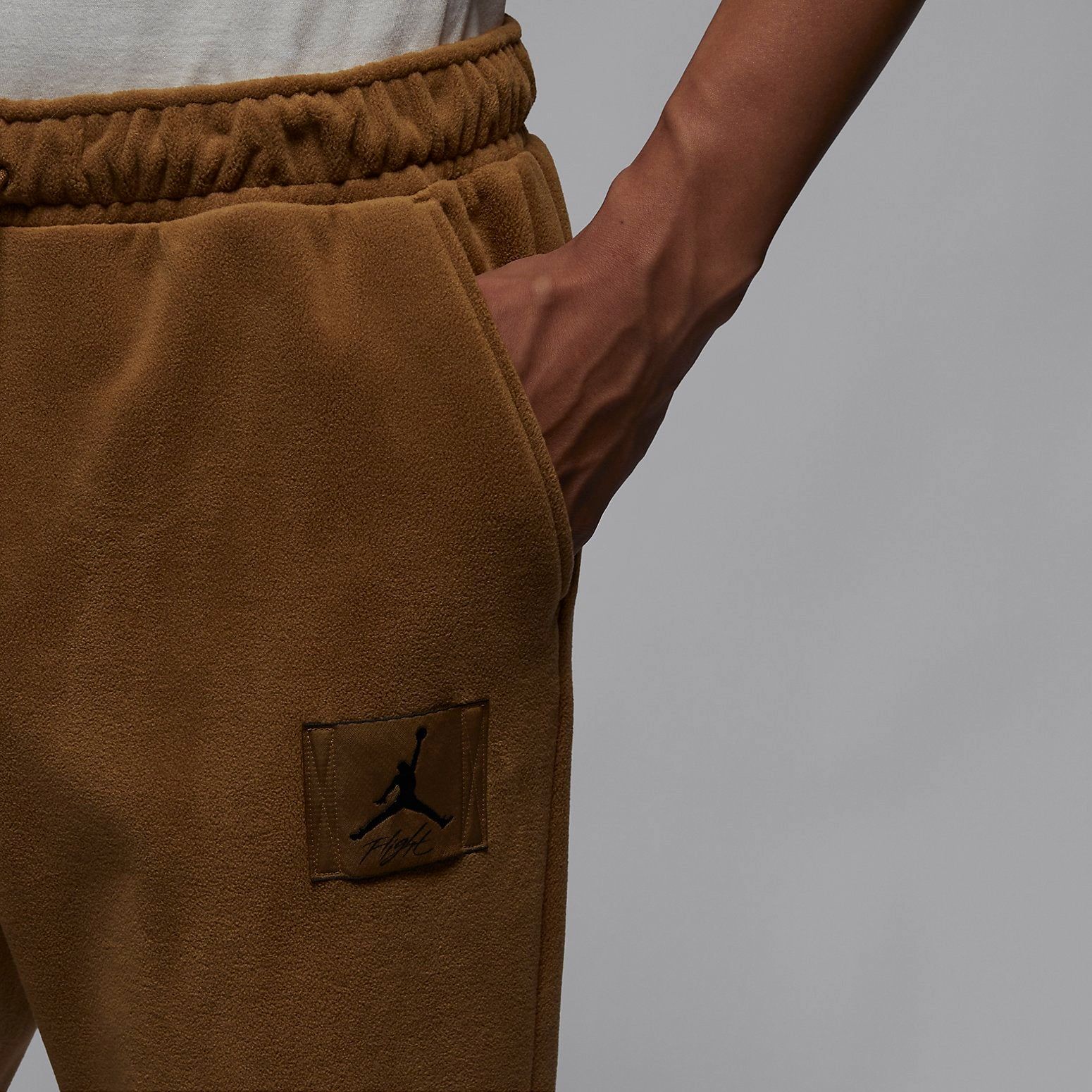 Air Jordan Essentials Fleece Winter Pants 'Brown' FD7532-281 sold by KicksCrew product image thumbnail 3