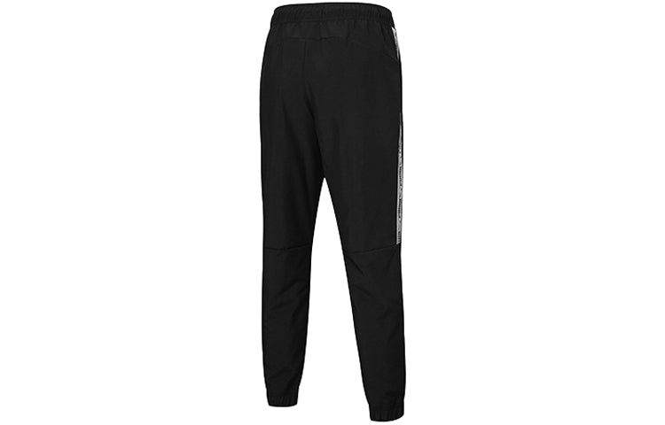 Puma Regular Track Pants 'Black White' 530693-01 sold by KicksCrew product image thumbnail 2