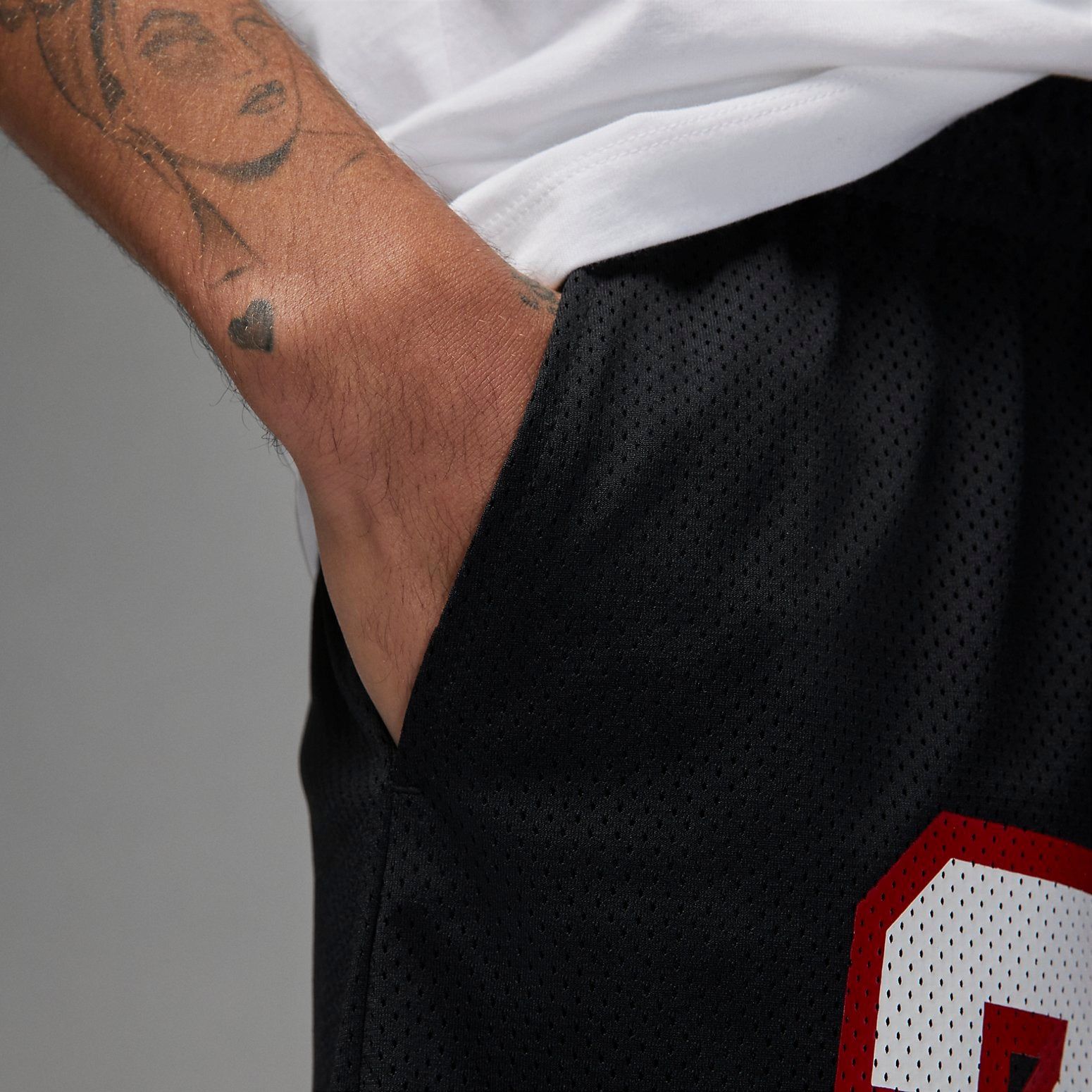 Air Jordan Essentials Graphic Mesh Shorts 'Black' DX9671-010 sold by KicksCrew product image thumbnail 3