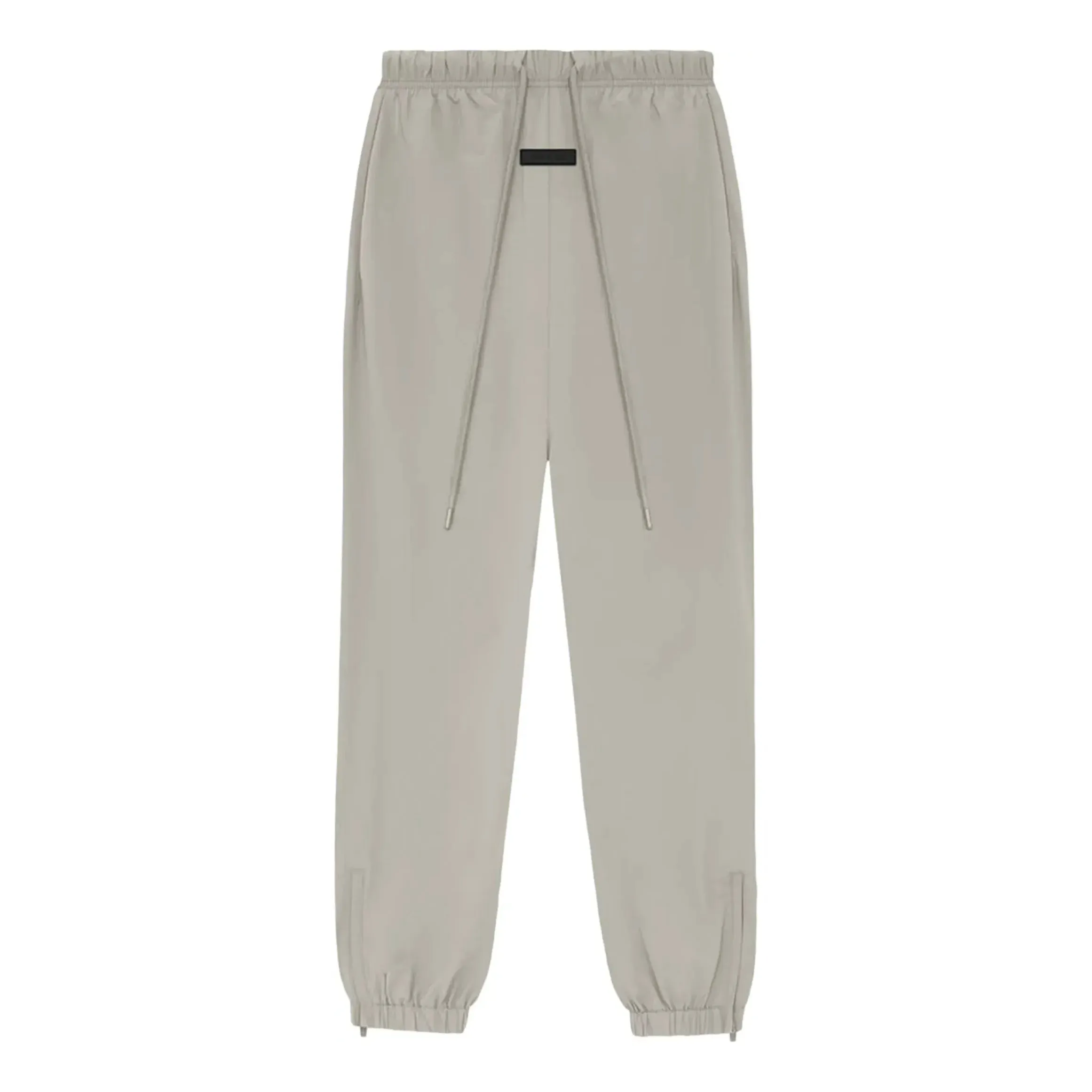 Fear of God Essentials SS24 Nylon Track Pants 'Seal' 130SP242165F sold by KicksCrew