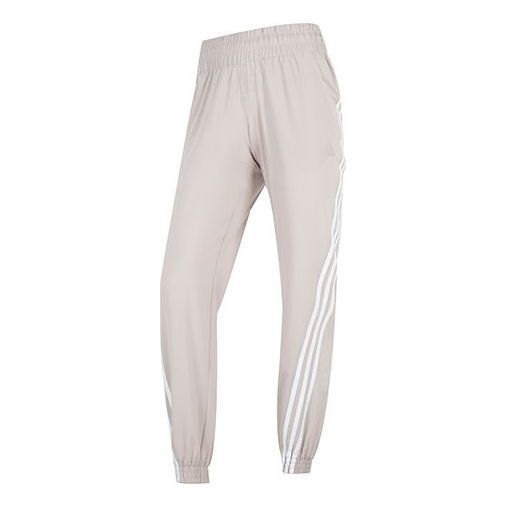 (WMNS) Adidas Trainicons 3-Stripes Woven Pants 'Beige' HZ7283 sold by KicksCrew