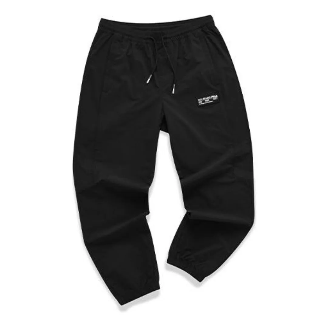 FILA FUSION Sports Printed Drawstring Woven Pants 'Black' T11M121806F-BK sold by KicksCrew