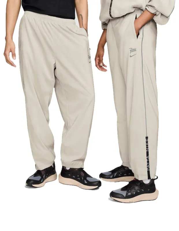 Nike x Patta Track Pants (Asia Sizing) 'Sanddrift' FJ3099-126 sold by KicksCrew
