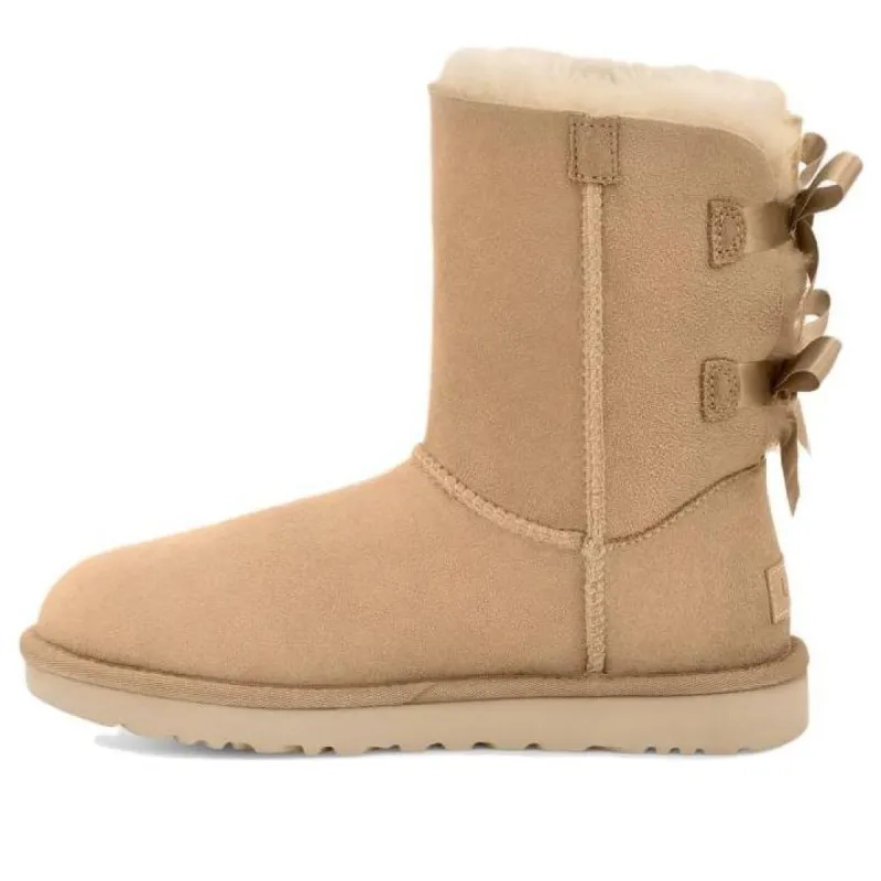 (WMNS) UGG Bailey Bow II Boot 'Mustard Seed' 1016225-MDSD sold by KicksCrew