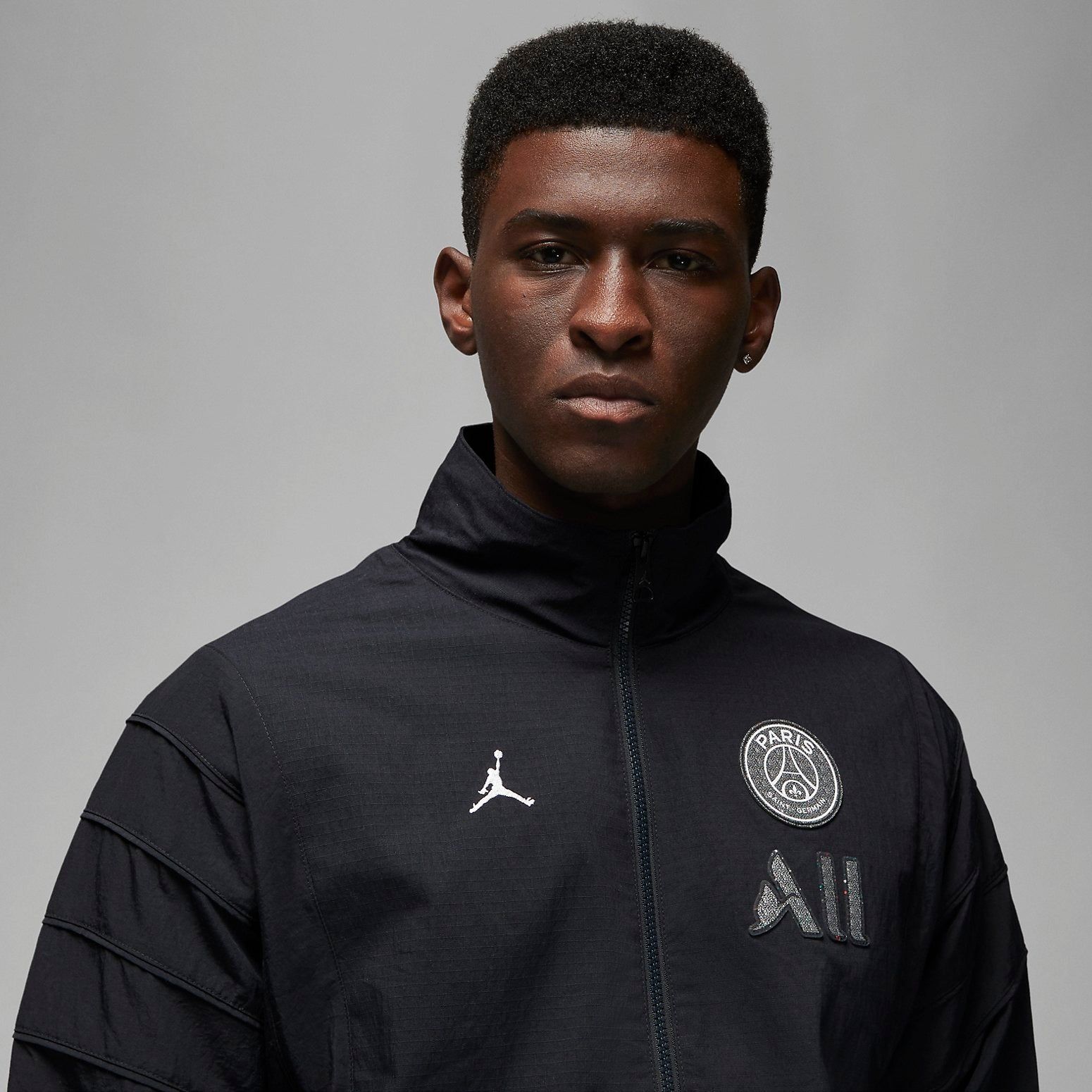 Air Jordan Paris Saint-Germain Anthem Jacket 'Black' DM3090-010 sold by KicksCrew product image thumbnail 2