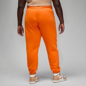 (WMNS) Air Jordan Brooklyn Fleece Pants 'Orange' DQ4480-847 sold by KicksCrew
