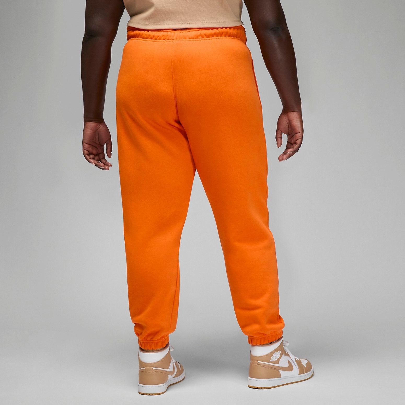 (WMNS) Air Jordan Brooklyn Fleece Pants 'Orange' DQ4480-847 sold by KicksCrew product image thumbnail 4