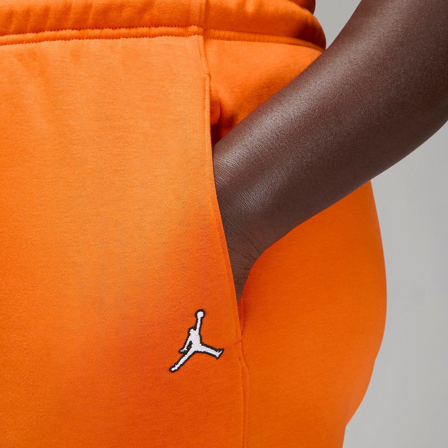 (WMNS) Air Jordan Brooklyn Fleece Pants 'Orange' DQ4480-847 sold by KicksCrew product image thumbnail 2