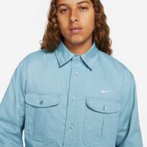 Nike SB Woven Skate Long-Sleeve Button Down 'Blue' DQ6288-494 sold by KicksCrew