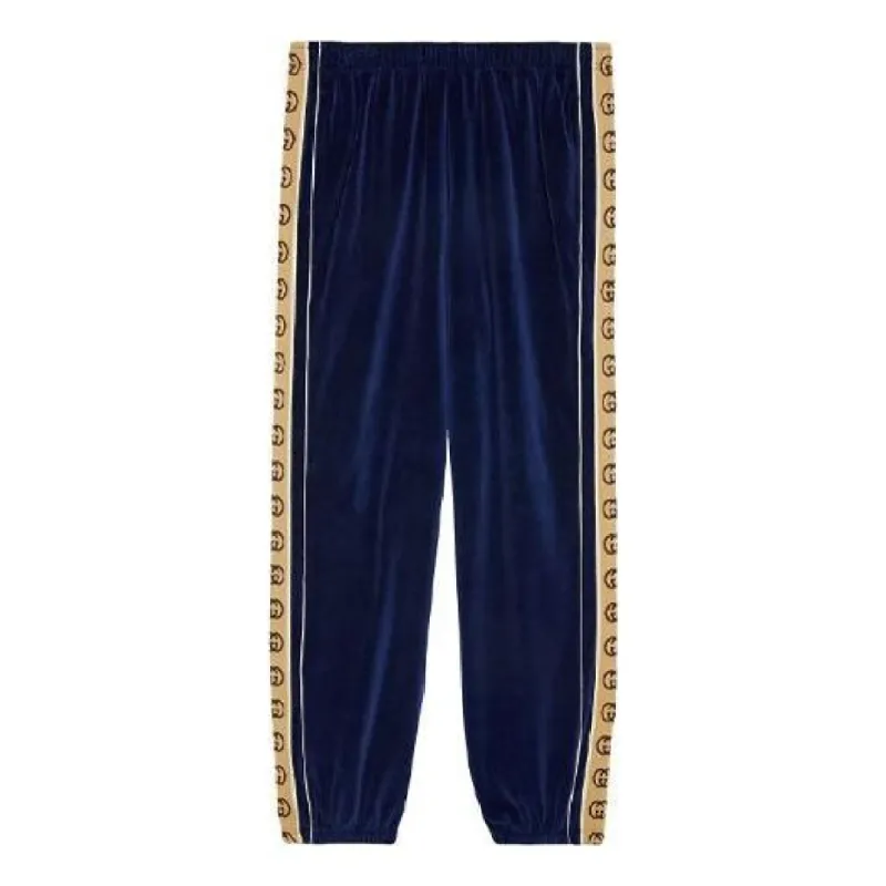 GUCCI Velour Taped Oversized Track Pant 'Blue' 574097-XJA6U-4541 sold by KicksCrew