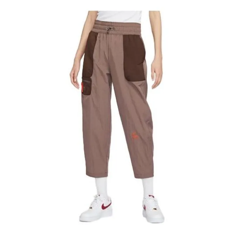 (WMNS) Nike Sportswear City Utility High-Waist Woven Pants 'Brown' DV8033-291 sold by KicksCrew