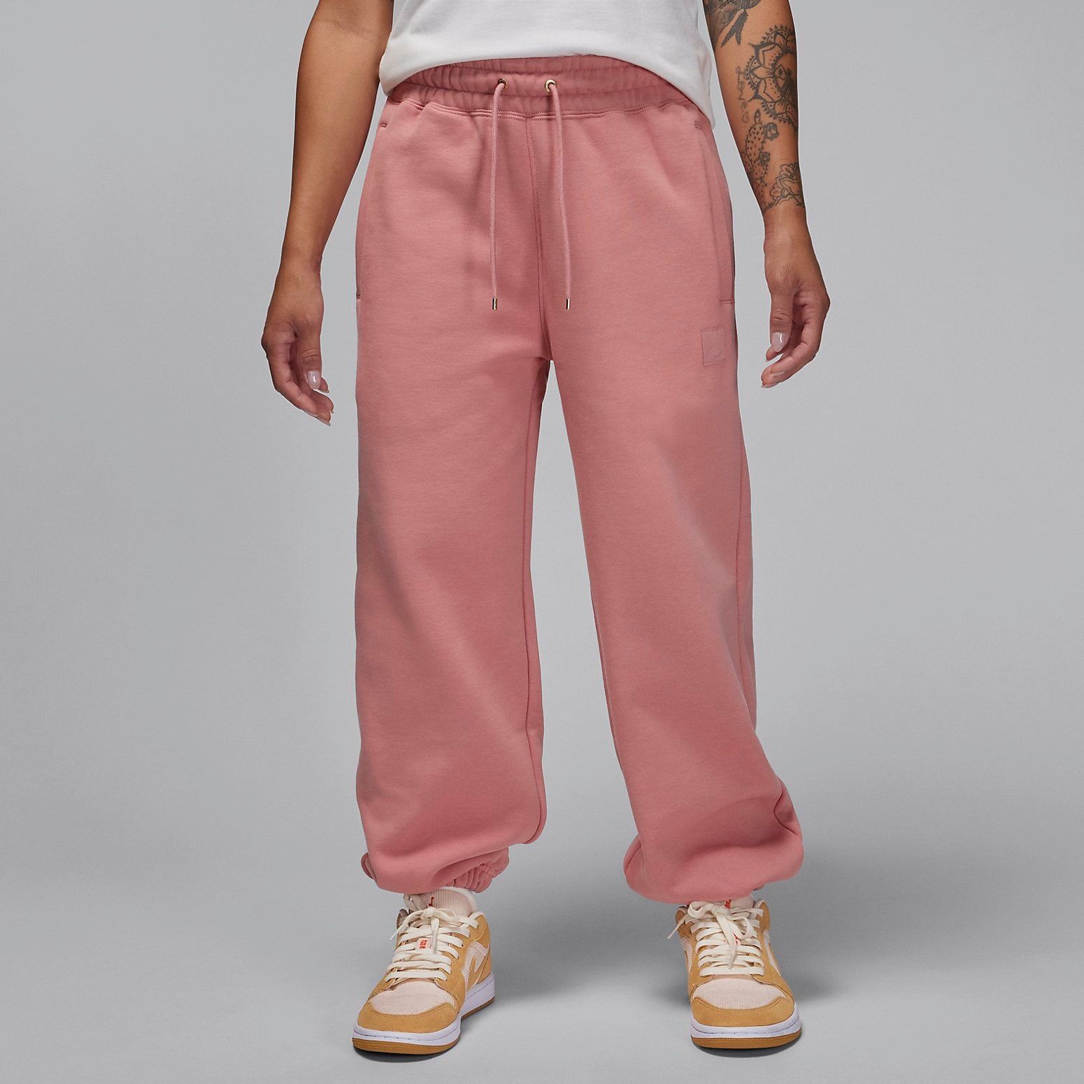 (WMNS) Air Jordan Flight Pants 'Red Stardust' FB5114-618 sold by KicksCrew product image thumbnail 2