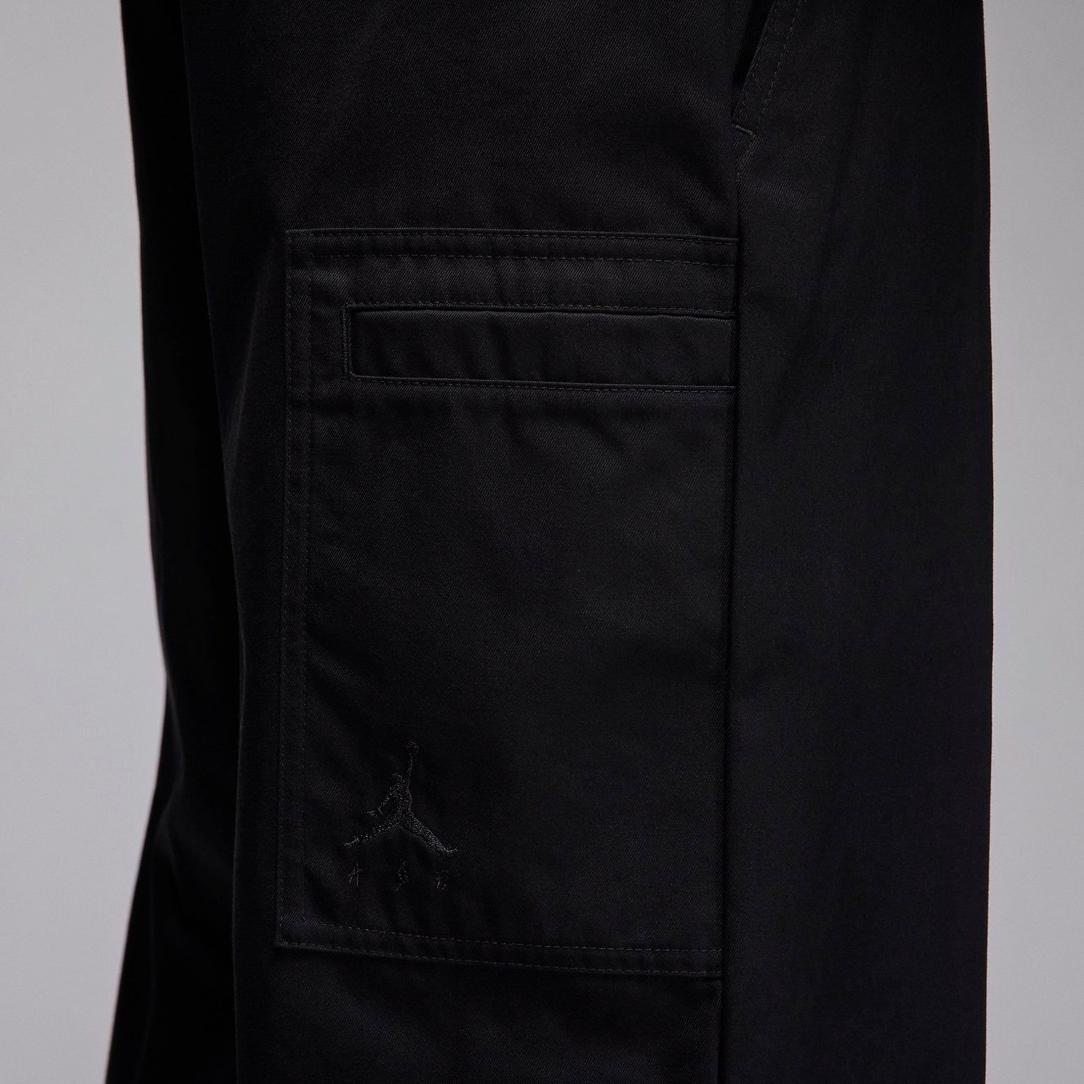 Air Jordan x J Balvin Woven Trousers 'Black' FJ6137-010 sold by KicksCrew product image thumbnail 4